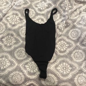 Low Back Princess Polly bodysuit w/ snap closure - size 8 or Medium. Worn once!